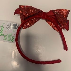 Claire’s red holiday headband with bow. New.